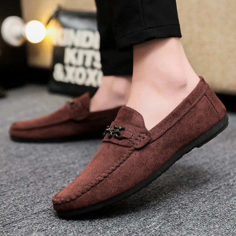 Waterproof men's slip-on loafers in black with round toe, low heel, and rubber sole