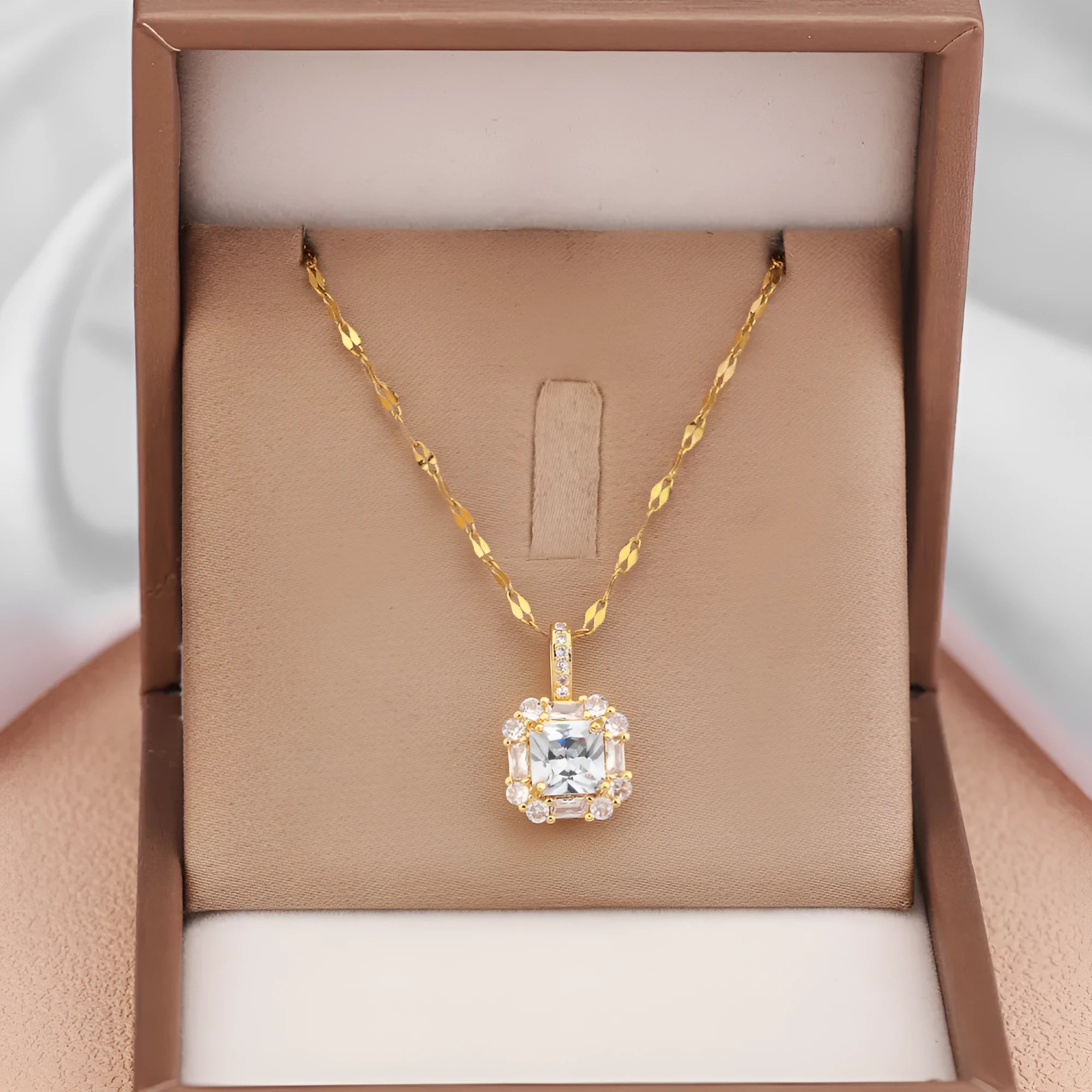 Gold clavicle chain necklace with geometric zircon pendant on titanium steel wave chain