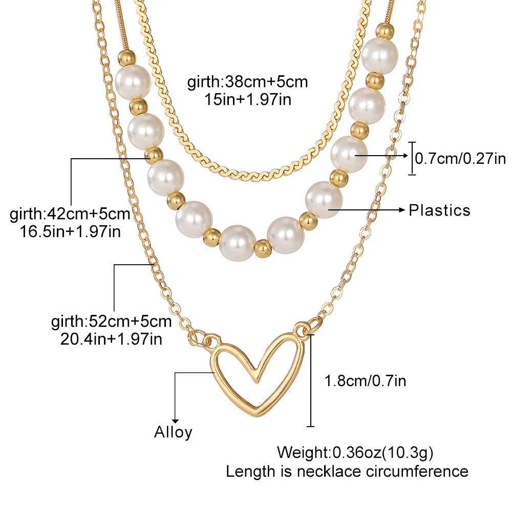 Vintage gold tone necklace with heart pendant on pearl chain, adjustable 41-50cm length