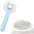 Blue self-cleaning cat grooming brush with one-click button and rubber-tipped needles