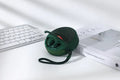 TG808 outdoor Bluetooth speaker with headset in black, showing horn and controls