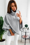 Women's long black batwing sleeve cardigan with plush velvet fabric and three-button placket