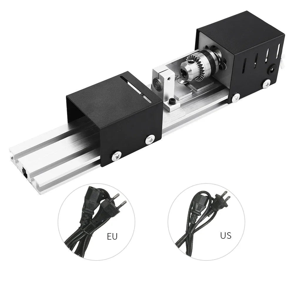 Mini metal woodworking lathe with carving knives and accessories on workbench