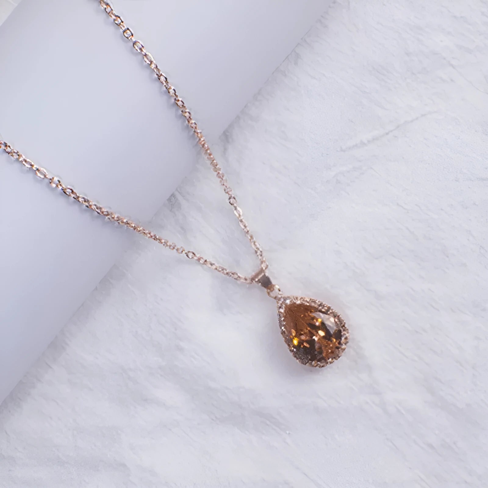 Women's drop shape necklace with geometric rhinestone pendant in multiple colour options