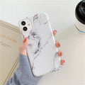Cartoon marble pattern TPU back cover case for iPhone on a blue powder background.