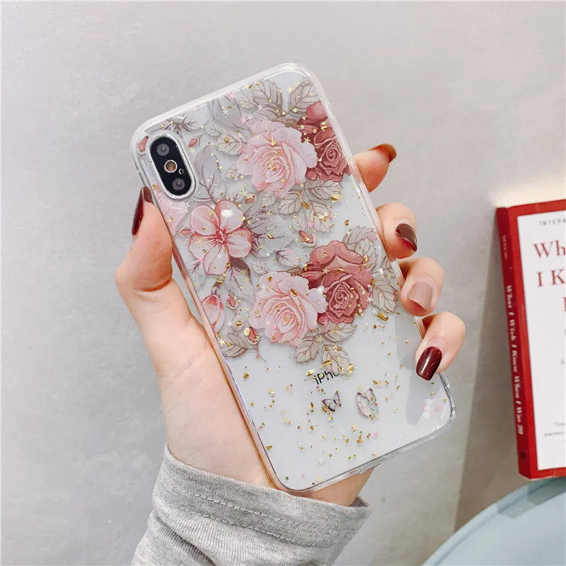 Gold foil epoxy flower pattern iPhone back cover case for iPhone 11 Pro on a table