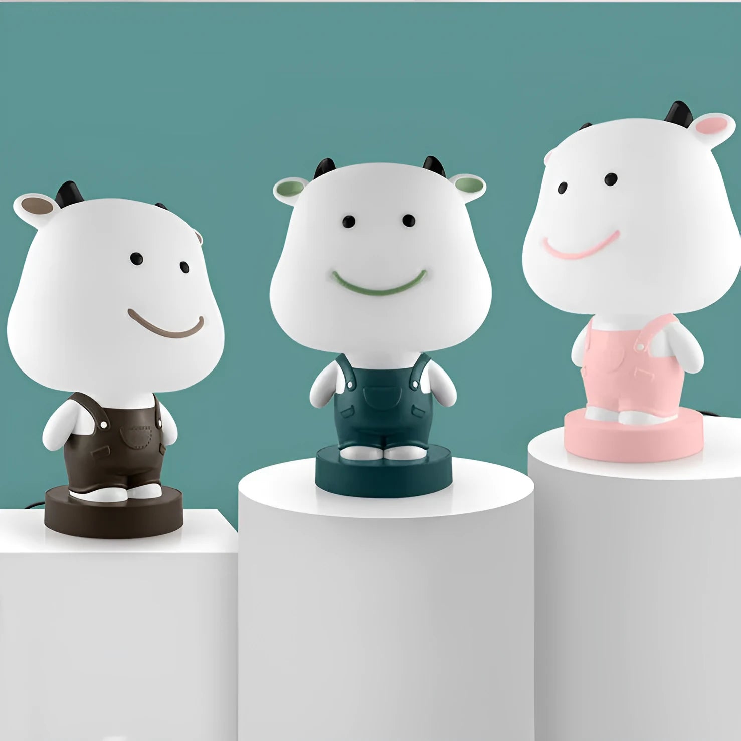 Cartoon style animal table lamp with plastic shade in random colour variation showing bear cattle rabbit or tiger design