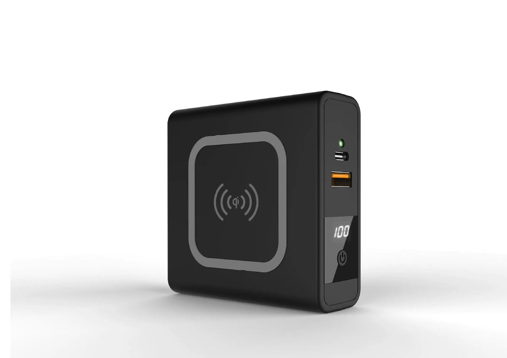 Black Super QI 10000mAh power bank with wireless charging top and foldable UK plug adapter attached.