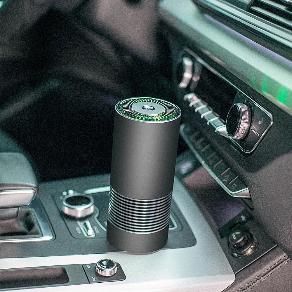 Compact black metallic car wireless air purifier with power cord for cigarette lighter socket