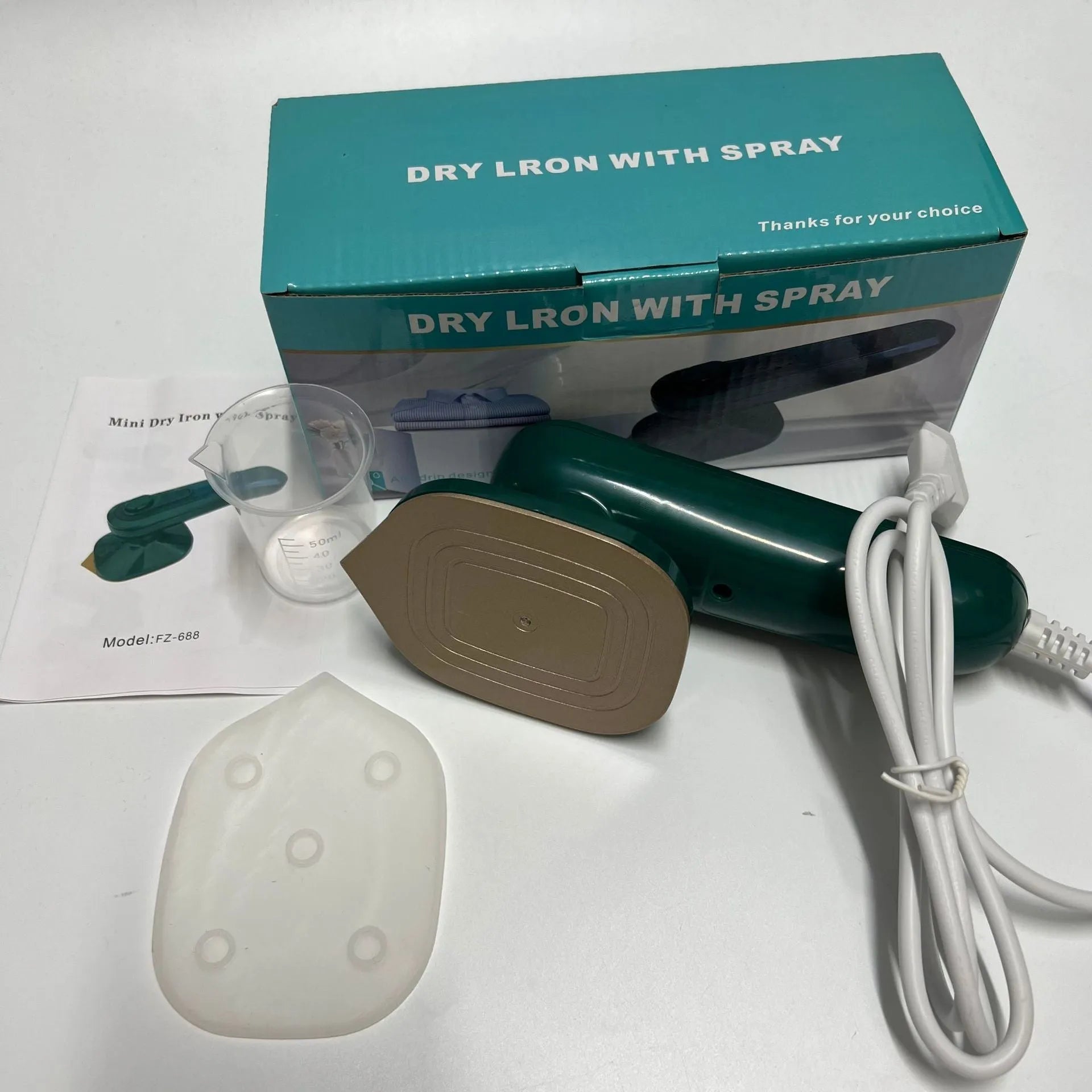 Dark green handheld portable garment ironing machine with titanium metal panel