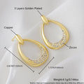 Yellow gold geometric drop earrings for women on a plain background, showing their 2.6 cm length.