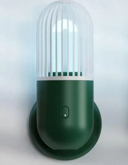 Portable capsule UVC disinfection lamp in four colours with dimensions 64x64x148mm