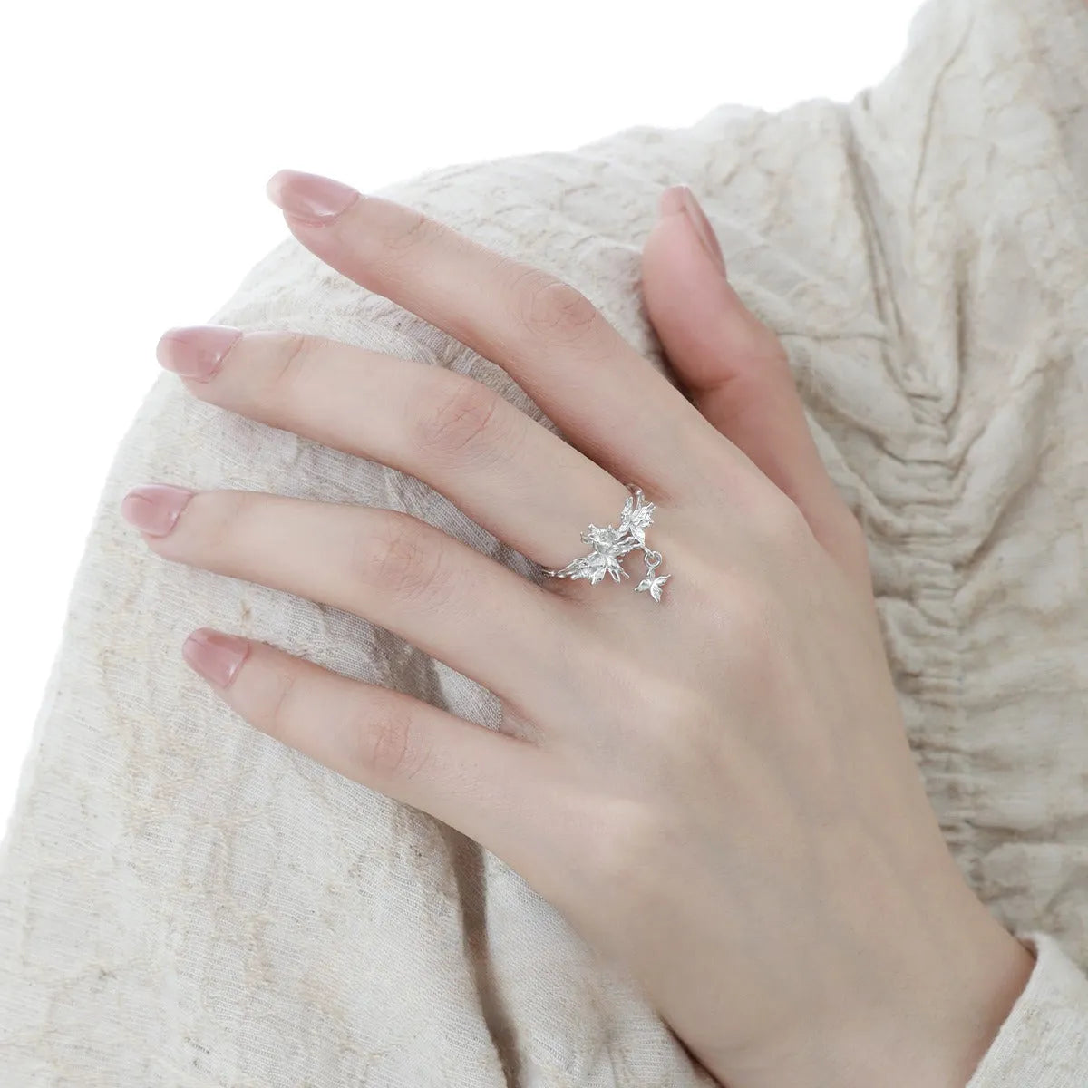 Adjustable silver butterfly ring with electroplated finish in white gold or 18K gold colour option