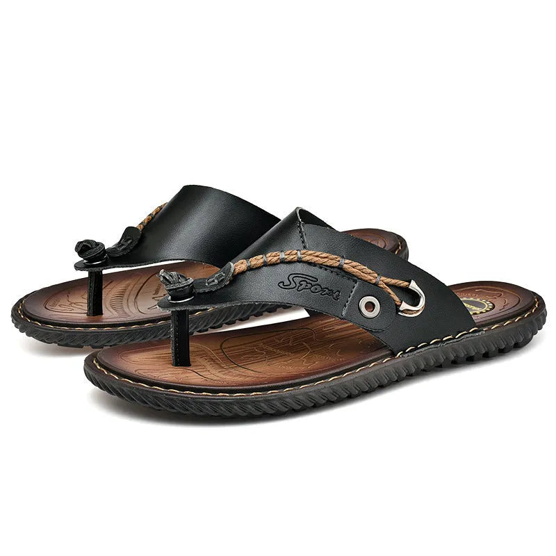 Men's black lightweight slippers with non-slip soles on wooden floor