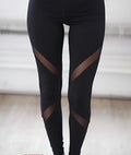 Women's yoga pants with butterfly mesh gauze panels in black, dry fit nylon spandex fabric
