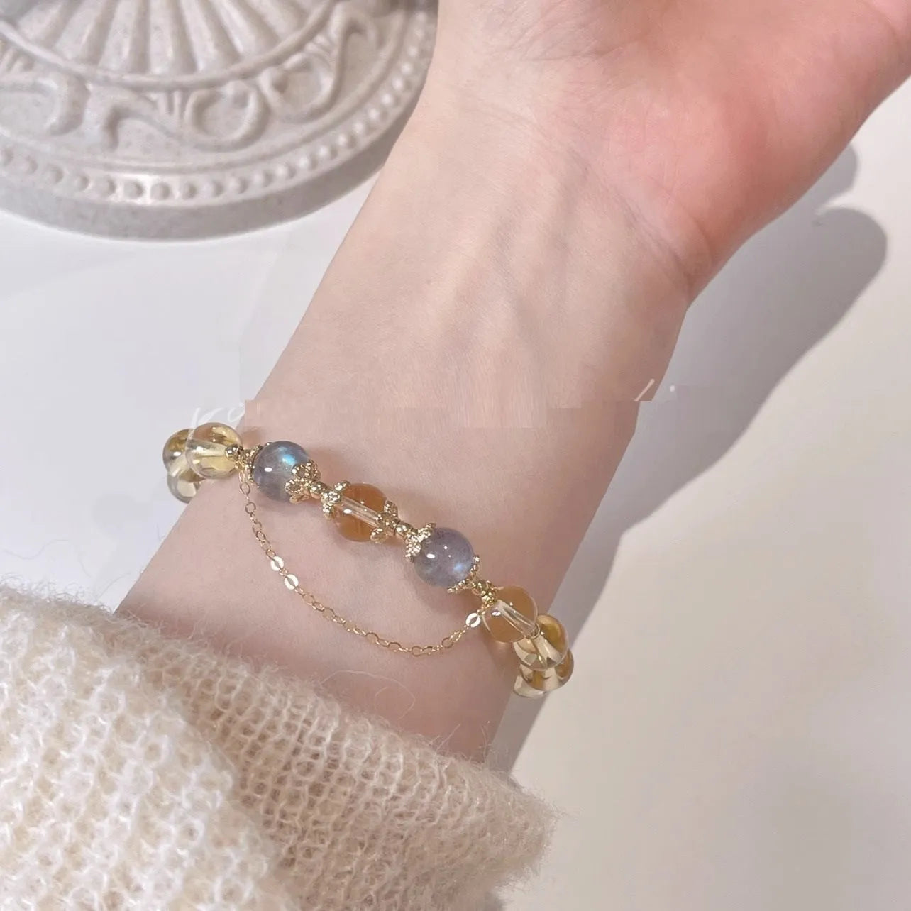Chinese style women's crystal bracelet with diamond shaped stones and electroplated 14K gold gilded finish in citrine moon colour