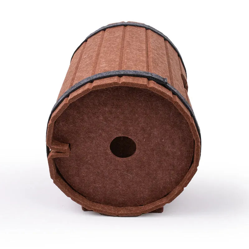 Assembled wine barrel shaped cat bed made from polyester fibre felt, showing three pieces and two straps.