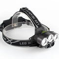 Outdoor headlamp showing long-range LED light beam and head-mounted design
