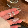 Korean style butterfly stud earrings in silver needle finish with heart bow and insect motifs on alloy post