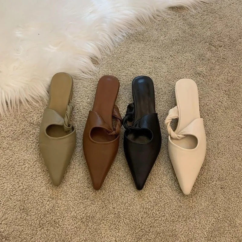 Women's soft leather slippers with a semi-toe box design in dark brown colour