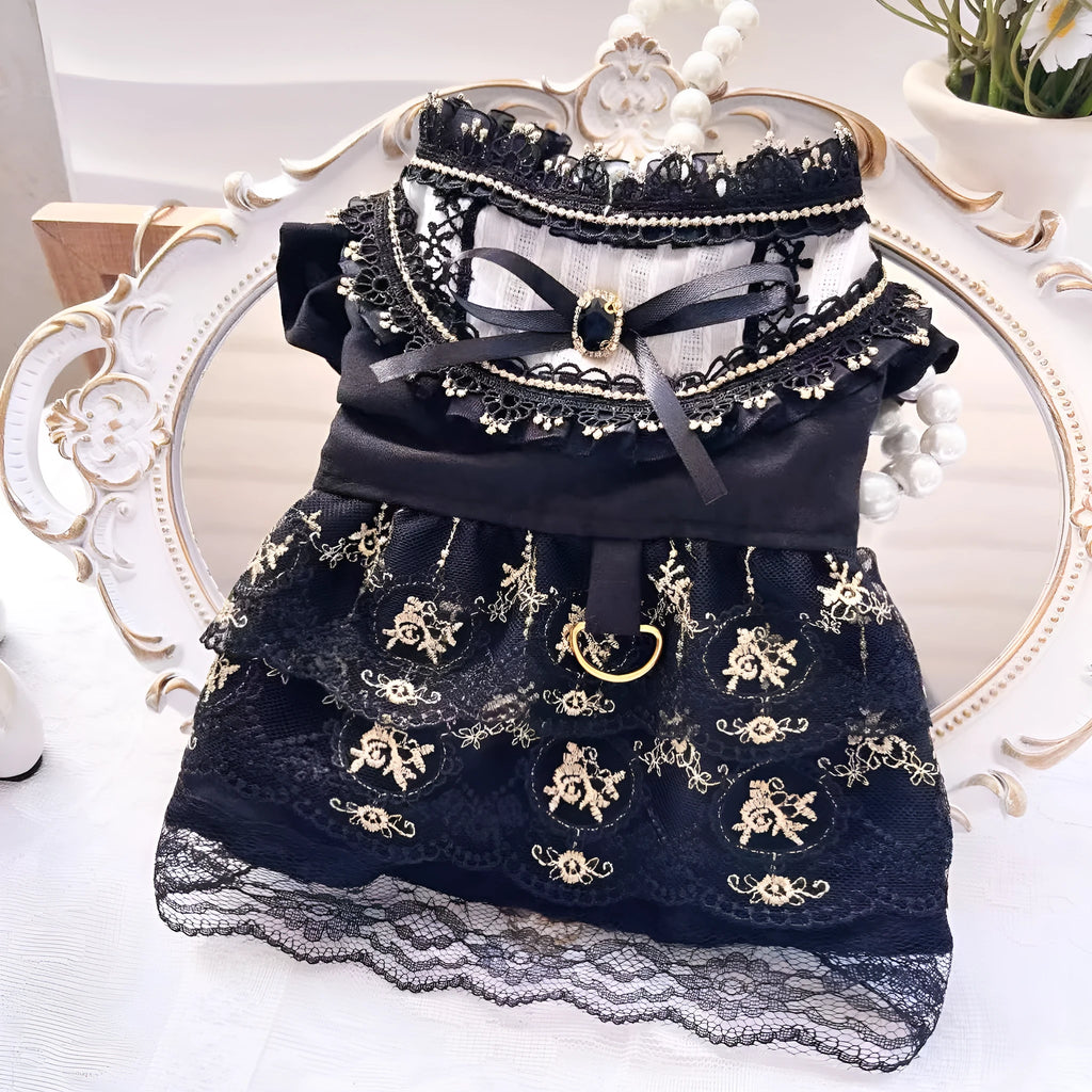Golden gothic-style skirt for a small dog or cat on a mannequin, showing princess design.