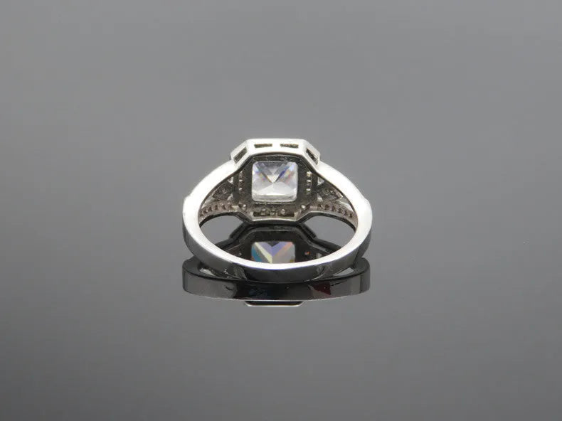 Women's geometric zircon ring with hollow design and platinum colour finish