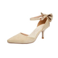 Black suede women's stiletto heels with a pointed toe and a decorative bowknot on the upper.