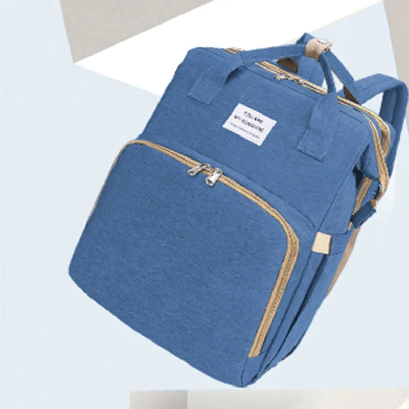 Lightweight nylon mother and baby bag with USB port, curved shoulder strap, shown in blue colour.