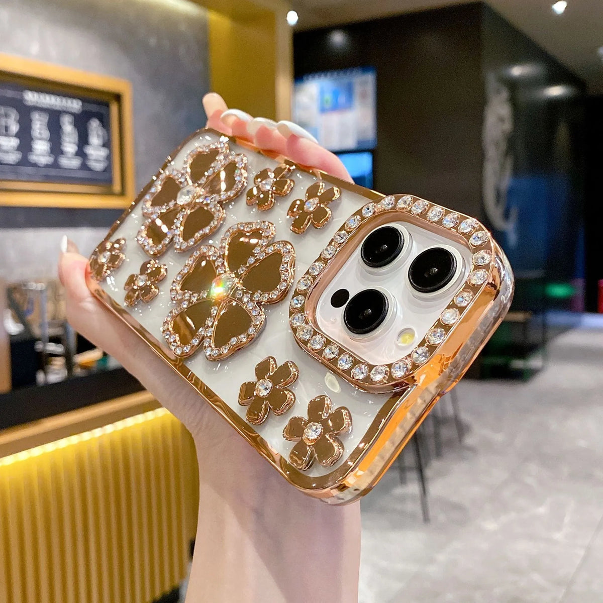 Plum blossom diamond flower plated phone case for iPhone in rose gold, TPU and acrylic back cover with bracket