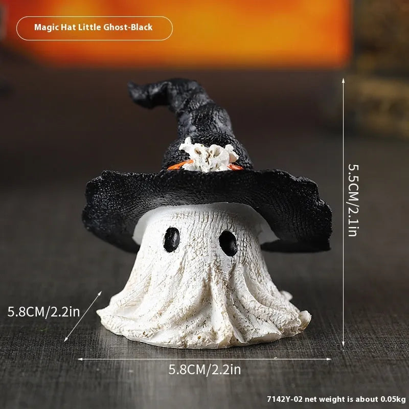 Black and purple resin wizard hat holiday ornament on a festive background.