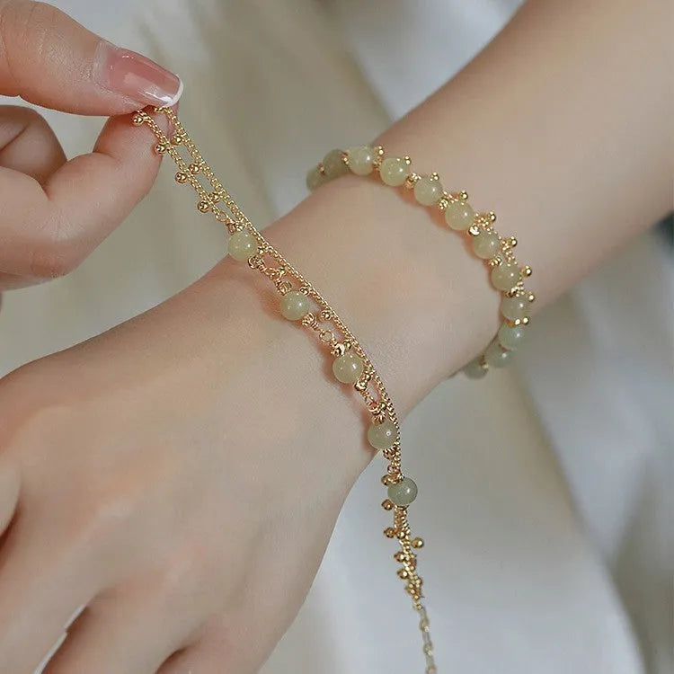 Natural Hetian Jade bracelet with princess running motif for women's daily wear.