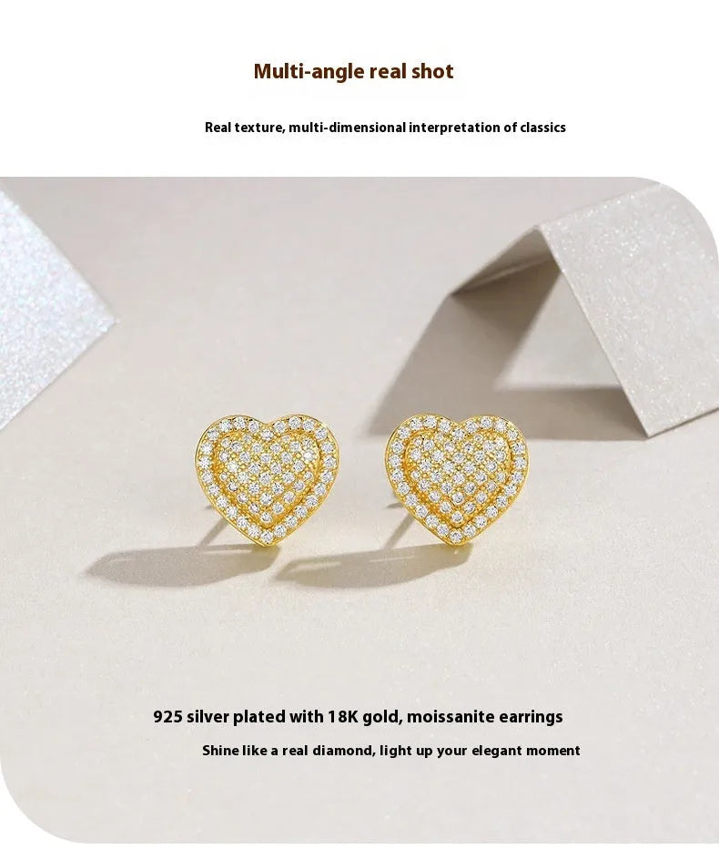 Gold tone heart-shaped stud earrings with clear moissanite stone on S925 silver base