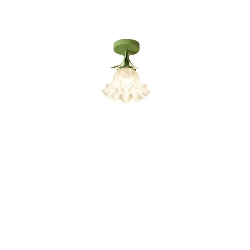 Cream coloured Linglan flower inspired corridor wall light with modern simple design on a white background.