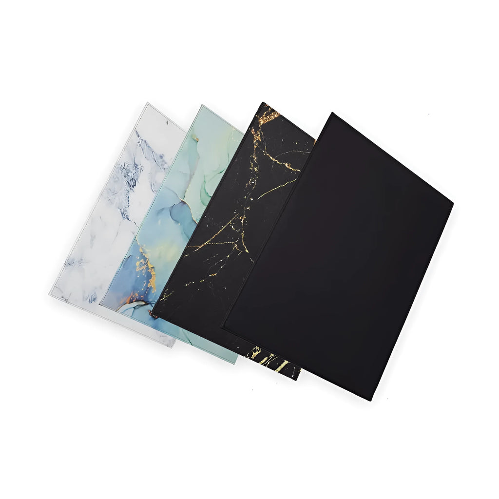 Silicone printing tablet pad in four colours on a desk with a tablet