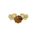 Adjustable silver ring with natural white shell and tiger eye detail, shown in white gold and 18K gold electroplated finishes.