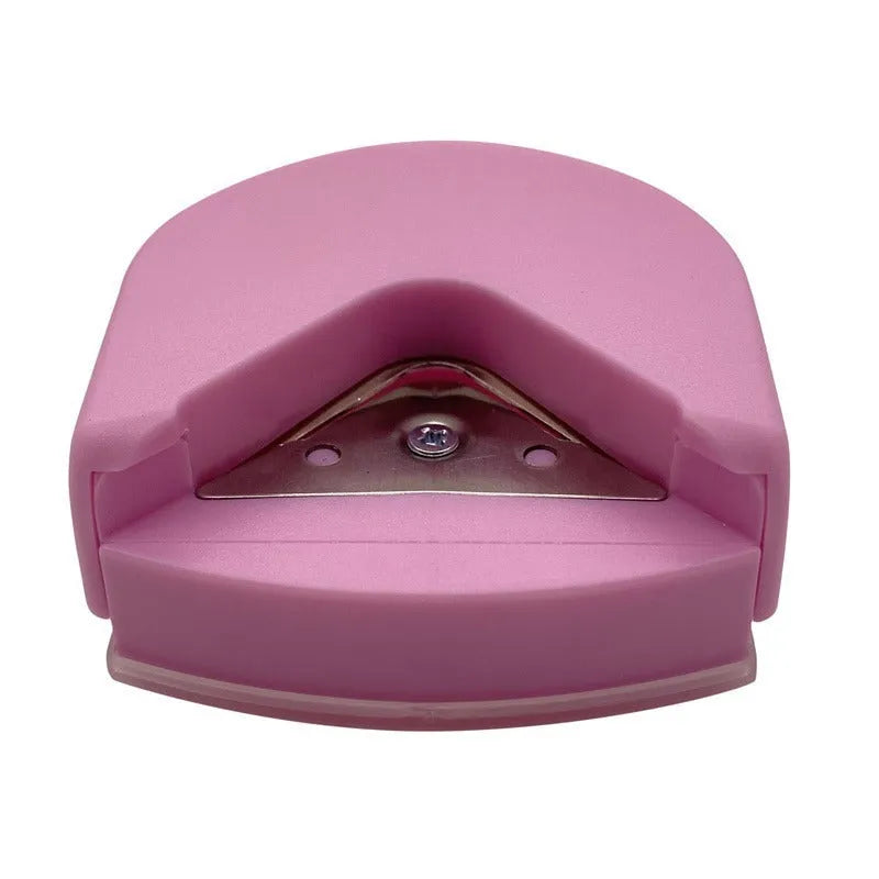 Black, blue, and pink plastic and metal business card corner cutter tool on a white background.