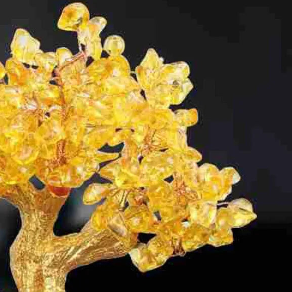 Citrine coloured resin money tree ornament with small water turtle model in Chinese style.