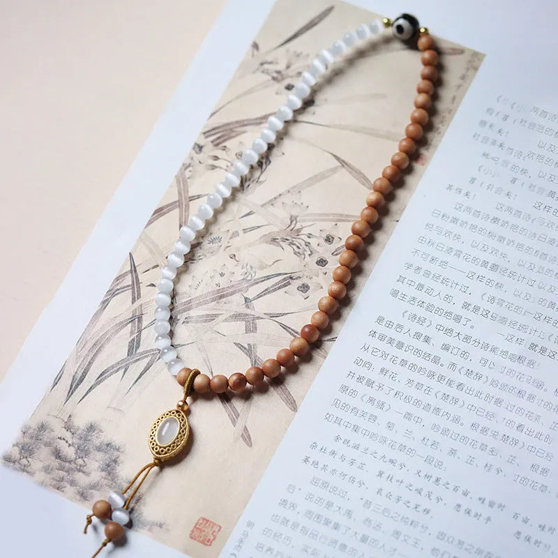 Mixed material bracelet with sandalwood double ring opal Tibetan beads and polished finish