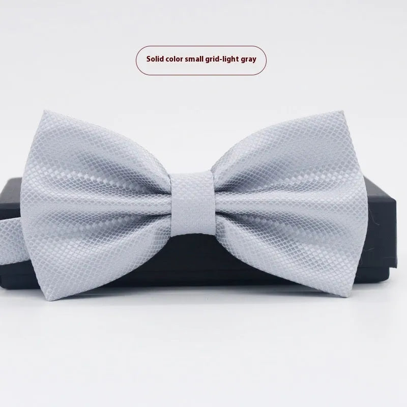 Men's solid colour flat head polyester bow tie on white background