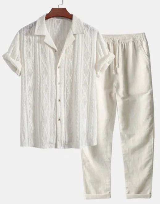 Lightweight linen-feel casual suit set with camouflage print trousers and a short-sleeved lapel shirt.