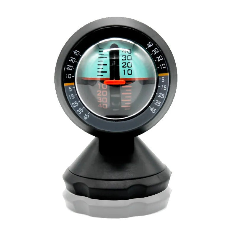 Black vehicle mounted slope meter for measuring inclination and rotation angles on dashboard.