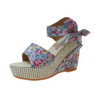 Women's floral wedge sandals with peep toe and adjustable ankle strap buckle.