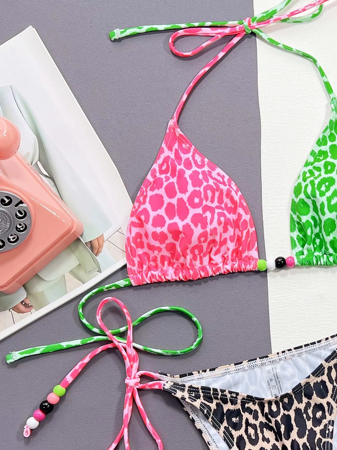 Women's leopard print bikini swimsuit with split briefs design