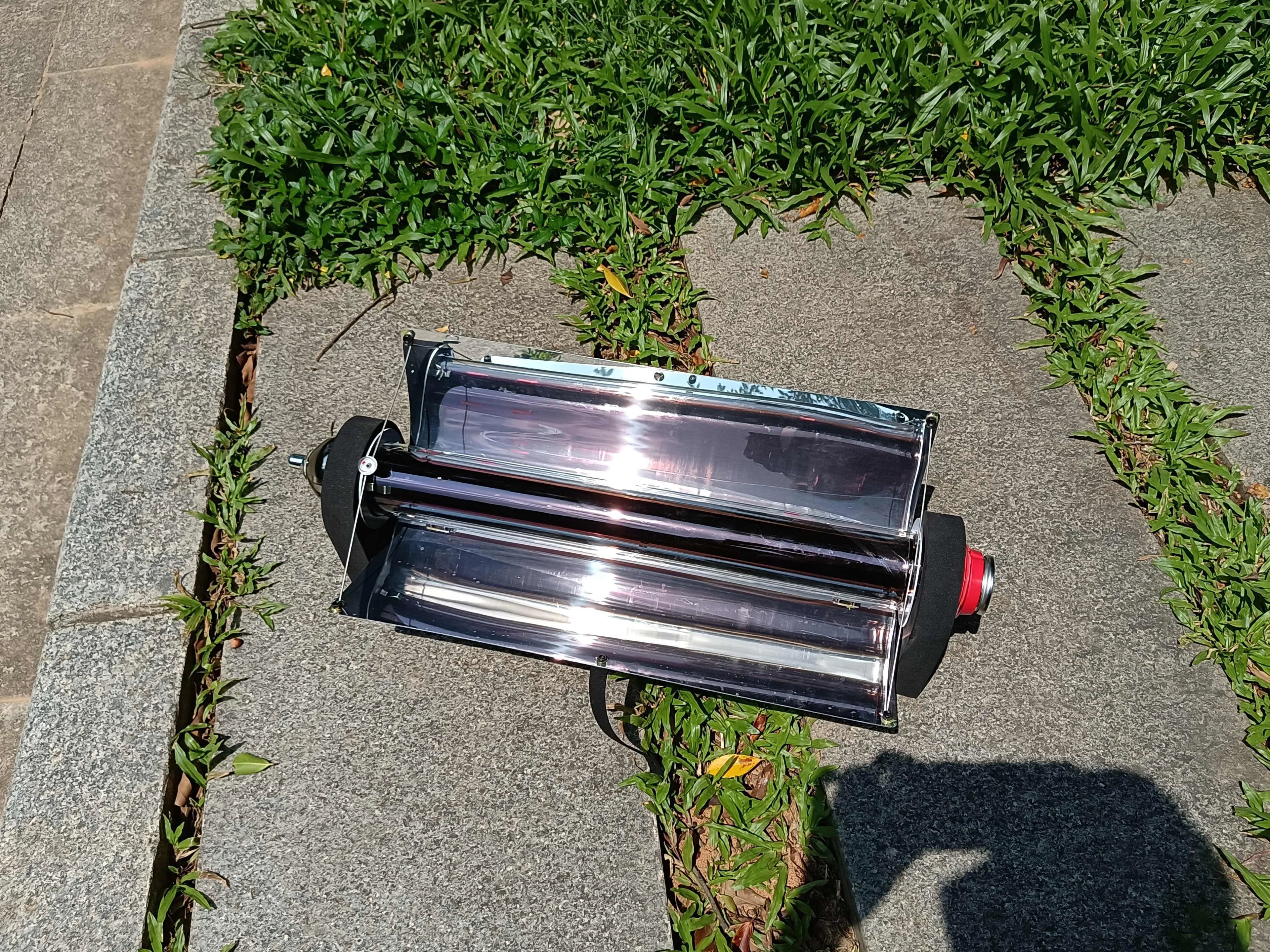 Outdoor portable smokeless vacuum oven grill in Silver with 1.5L tube and 50cm food tank on grass