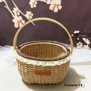 Hand-woven natural straw basket in a rustic style, measuring 19cm by 12cm.