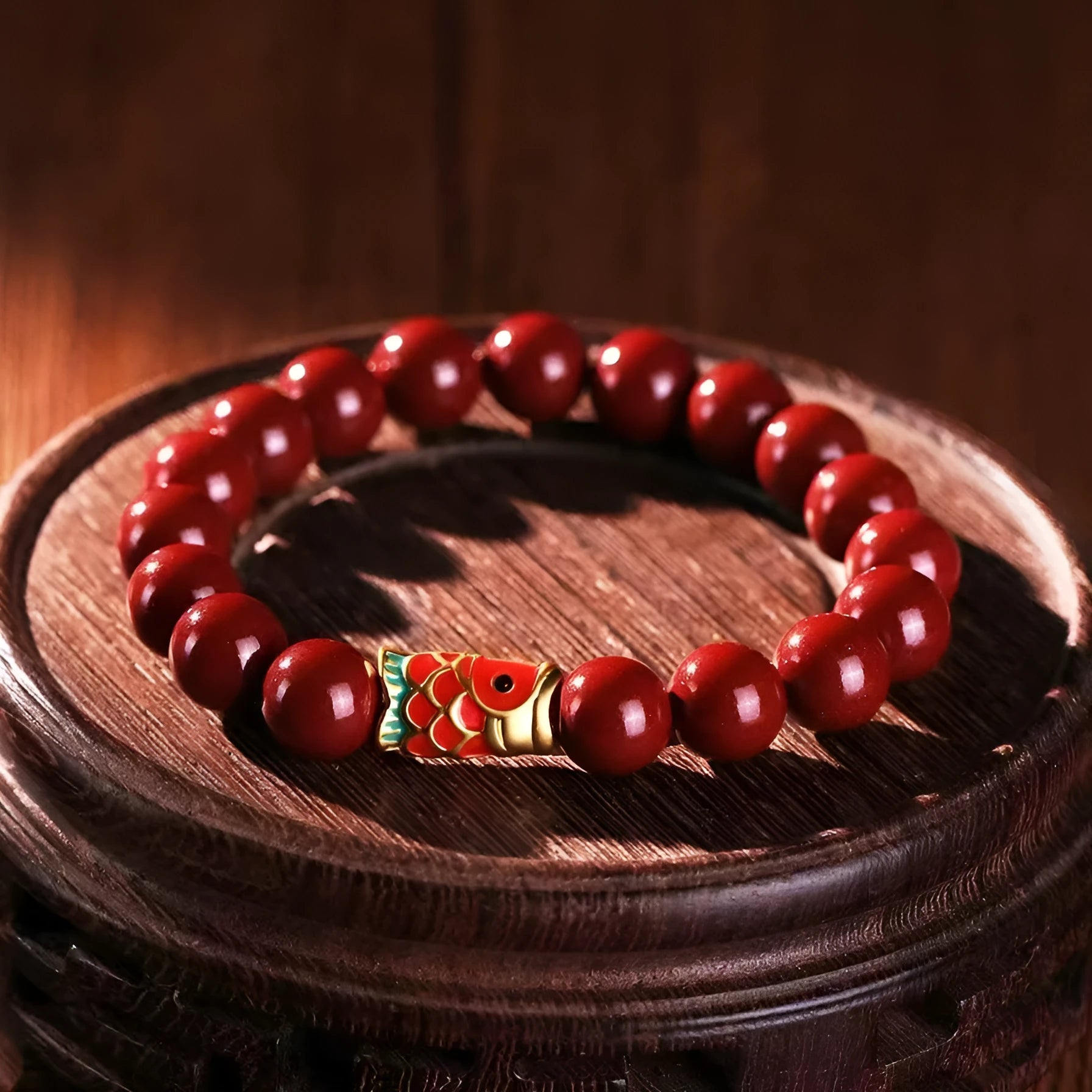 Handmade natural cinnabar koi bracelet with golden ball in national style