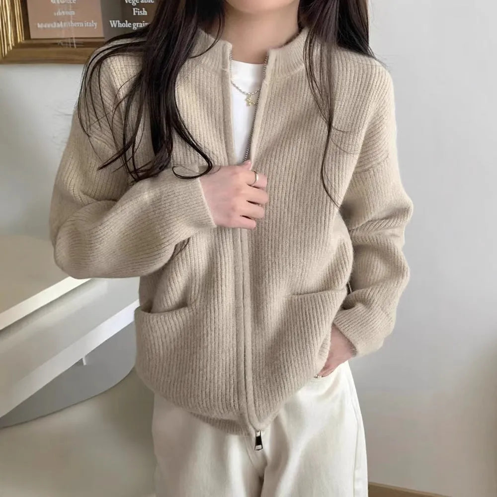 Beige women's cardigan-style sweater coat with long sleeves made from soft viscose.