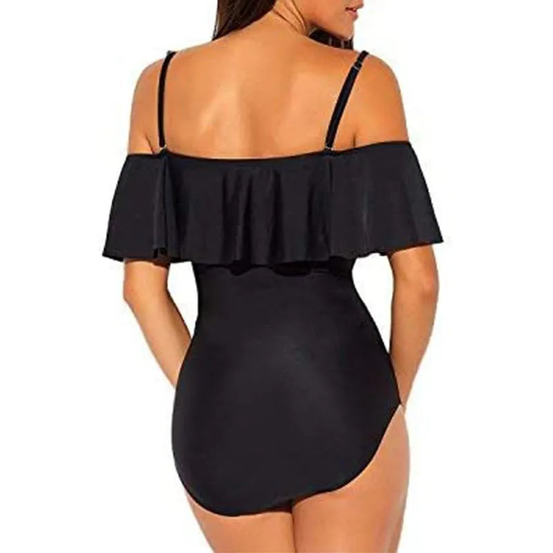 Black one-piece women's swimsuit with cut-out design and ruffled tube top straps
