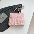 Black and pink college style bow tote bag with large capacity and double shoulder straps.