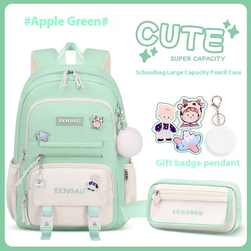 Pink waterproof Oxford cloth school backpack for girls with curved shoulder straps.